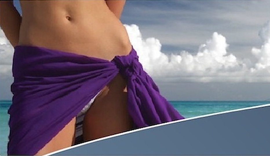 Woman at the beach with a purple sarong — imagine transforming the shape of your body